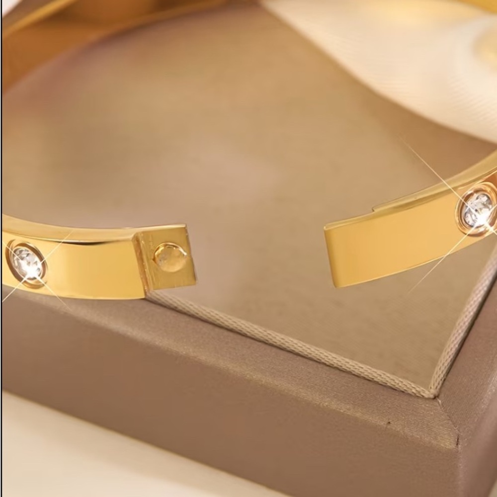 Stainless Steel With Cubic Zirconia Gold Four Leaf Clover Bangle Bracelet - Picture 3 of 4